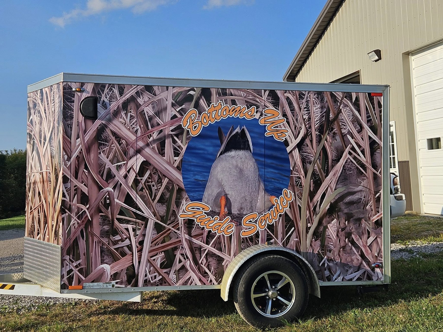 Bottoms Up Guide Service trailer wrap